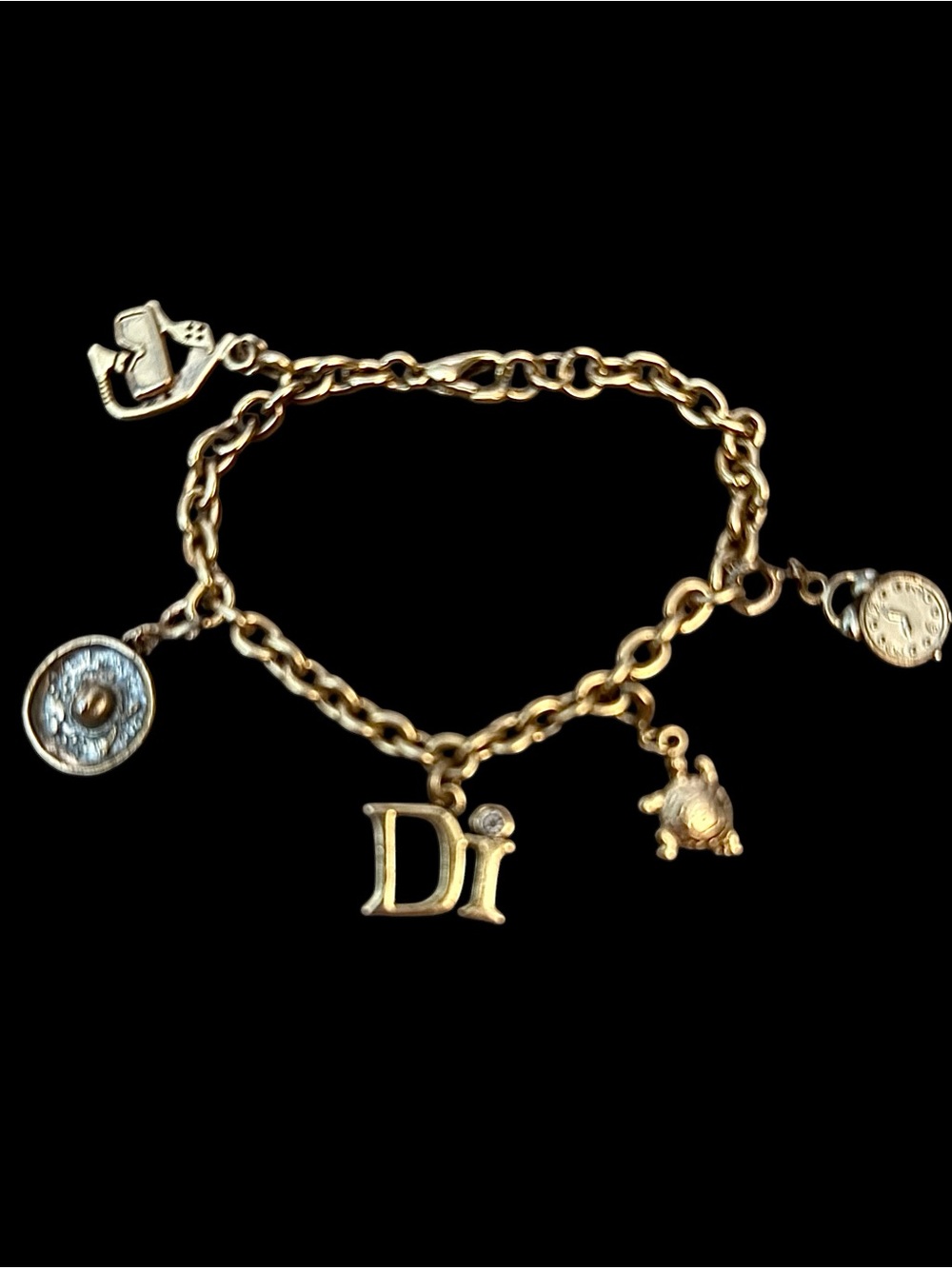 Vintage Diamond International gold tone souvenir charm bracelet